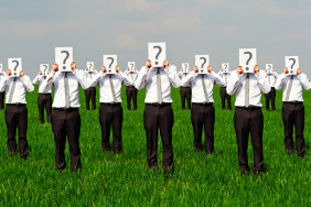 crowd of businessmen with question mark. concept photo